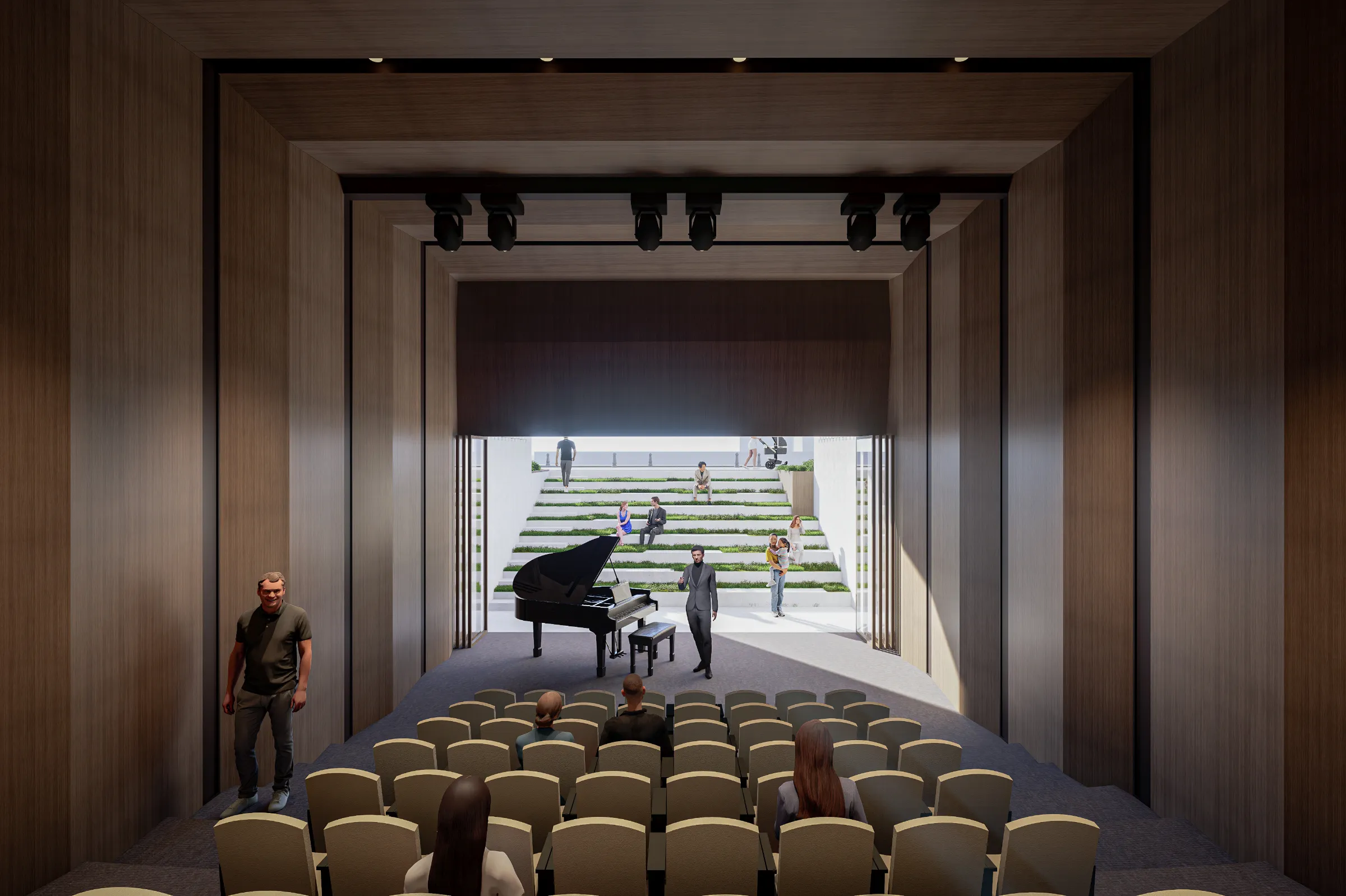 Pocket theatre interior with a grand piano on stage and the rear wall open to the stepped outdoor amphitheatre